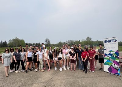 SHIFT young professionals golf lesson event group photo.